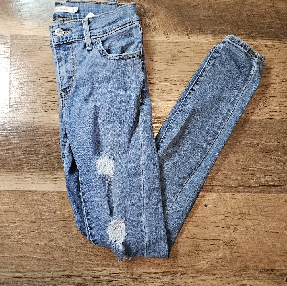 Womens Levi 710 super skinny distressed jeans size 25.